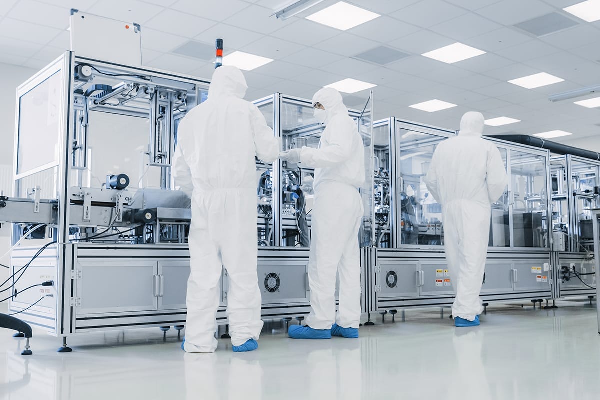 Image depicting automated machines in a medical device cleanroom for quality control